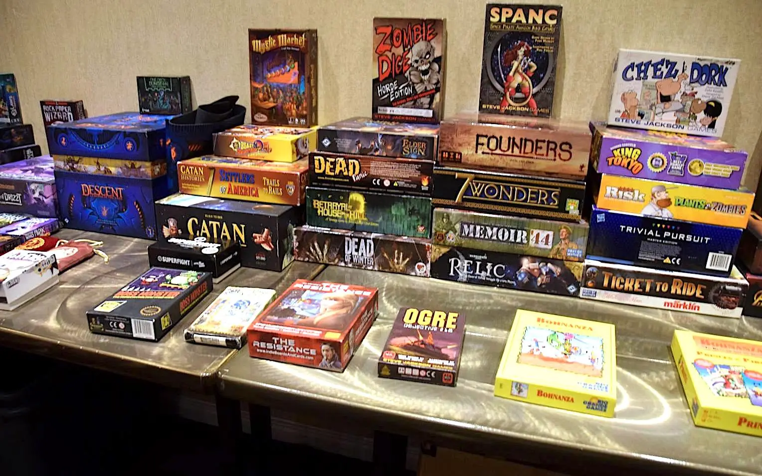 picture of a table with lots of different kinds of table top games