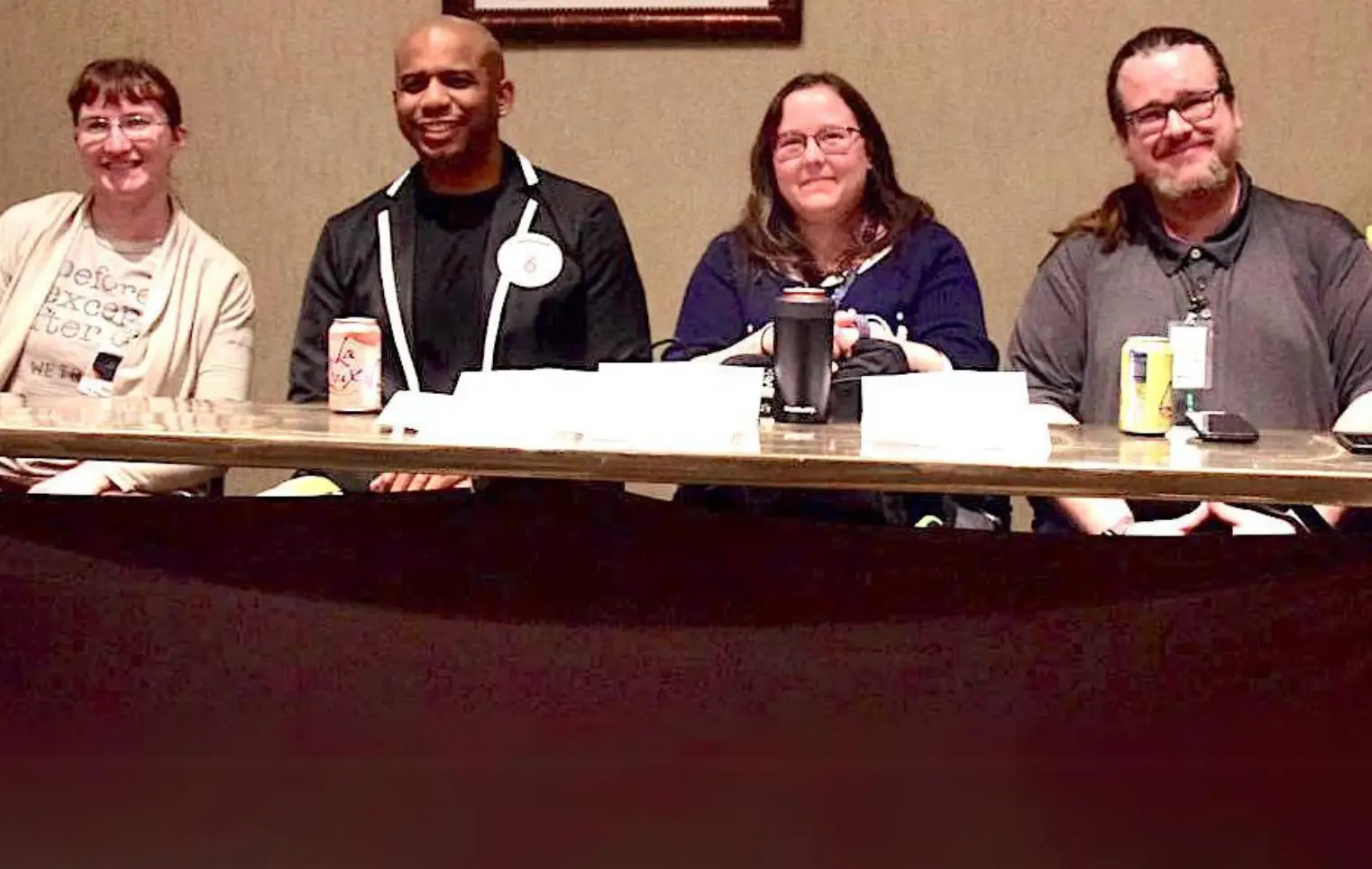 Picture of a marscon panel with 4 panelists sitting at a table