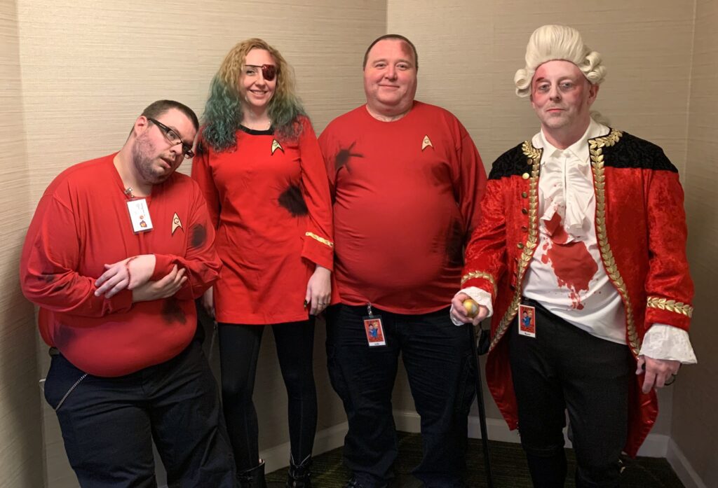 Group picture of Star Trek "red shirts" who have met their demise.