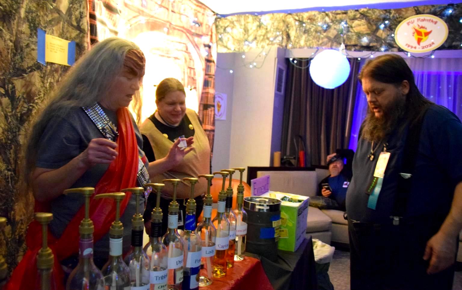 image of klingons serving drinks in a party room